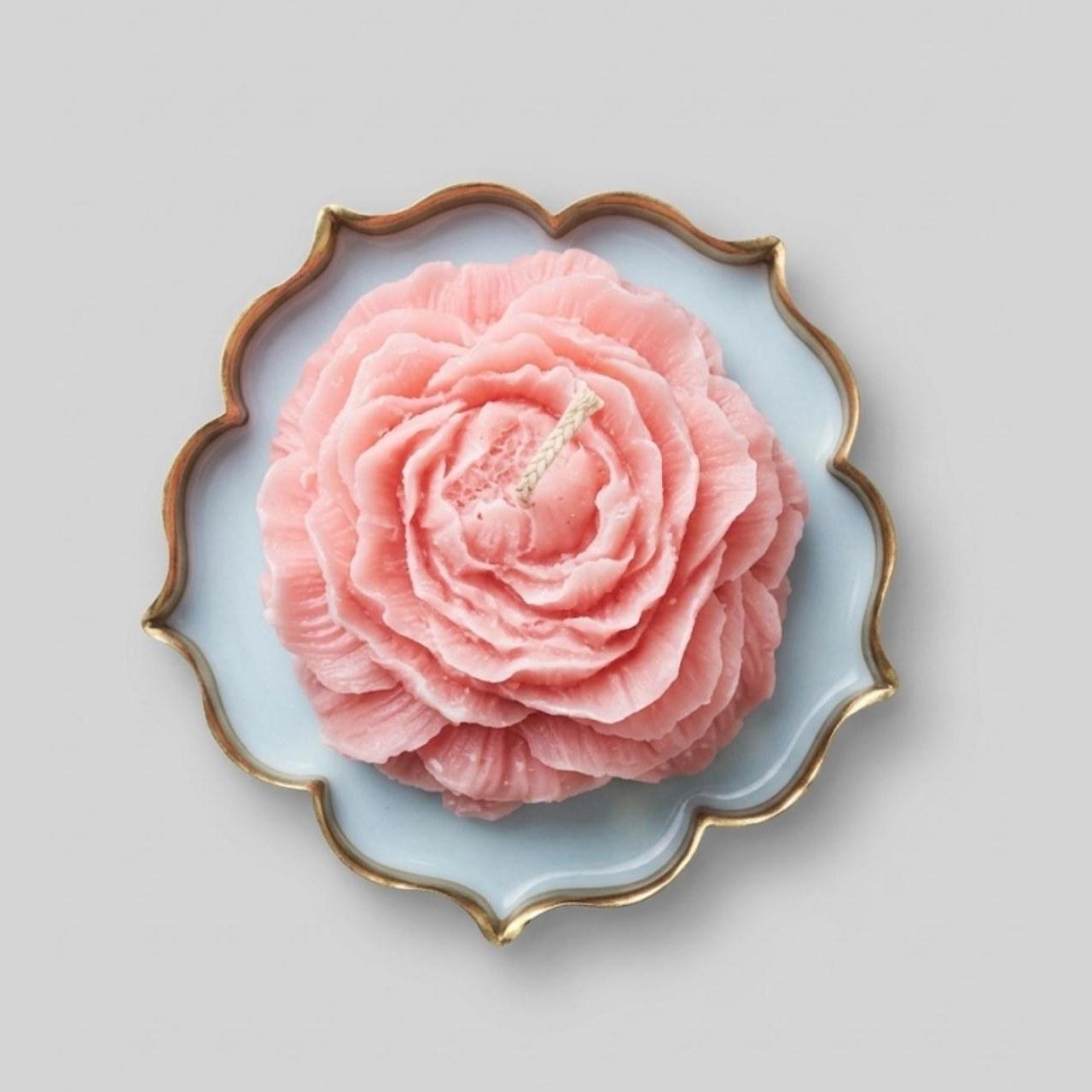 Rose Brass Jar Candle seen from above, showing the layered wax petals and braided wick
